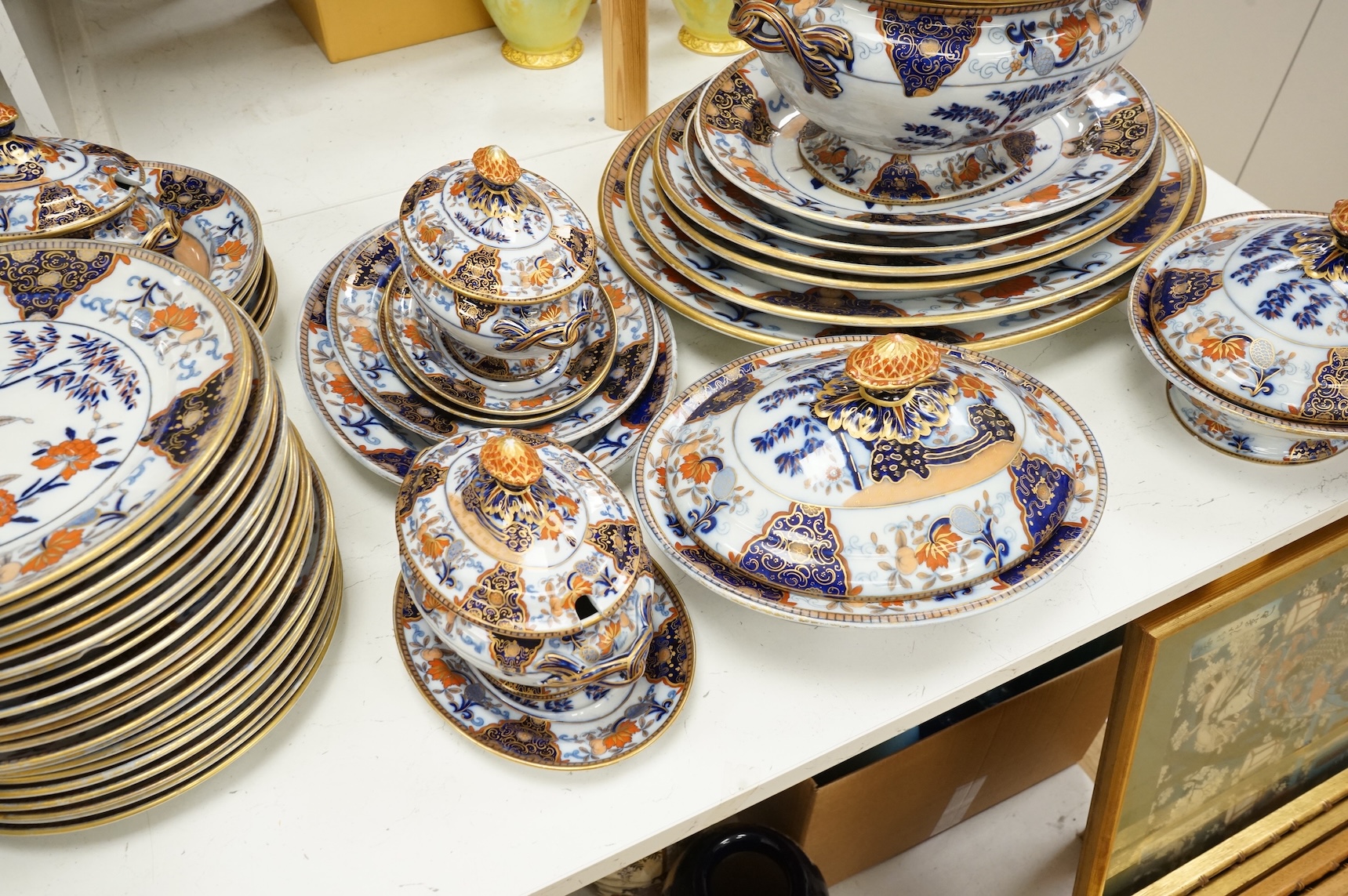 A Victorian Davenport dinner service to include tureens, dinner plates and soup bowls, largest 52cm wide